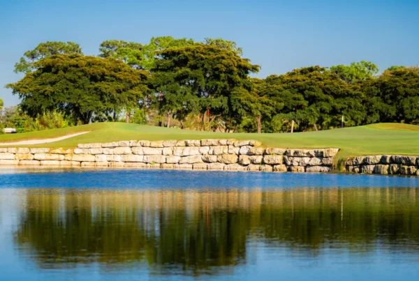 Beautiful golf course landscape showcasing AdVenture SWFL's expertise in golf and country club design and development.